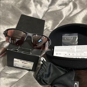 Oakley Sunglasses with Black Frame and Brown Lenses
